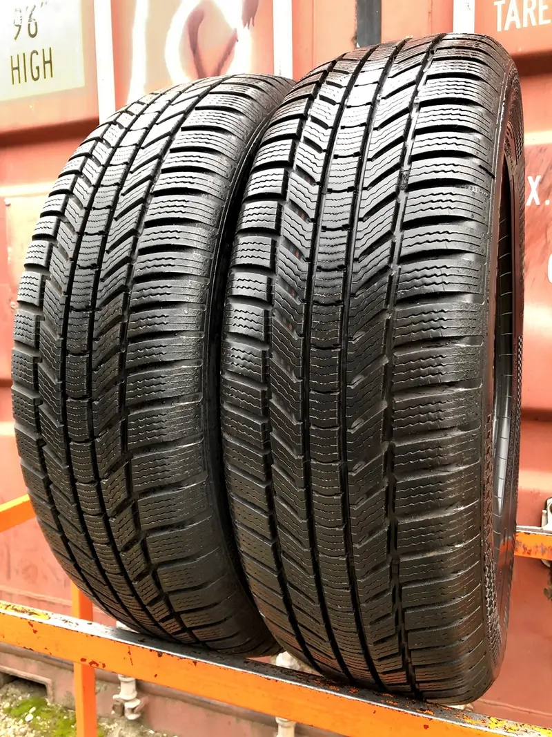 Пара б/у шин 215/65 R17 Continental ContiVikingContact 7